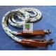 White with green fleck looped rope reins with light tan leather water straps